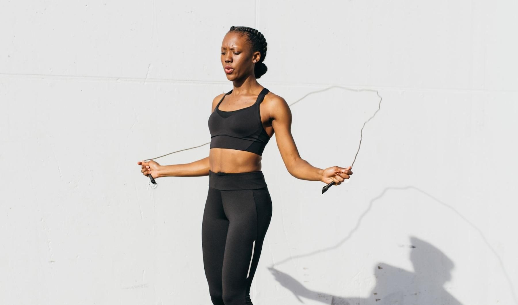 a woman jump-roping